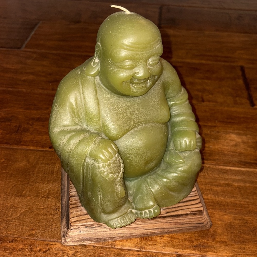 Hallmark 1970s laughing Buddha Candle on wood base